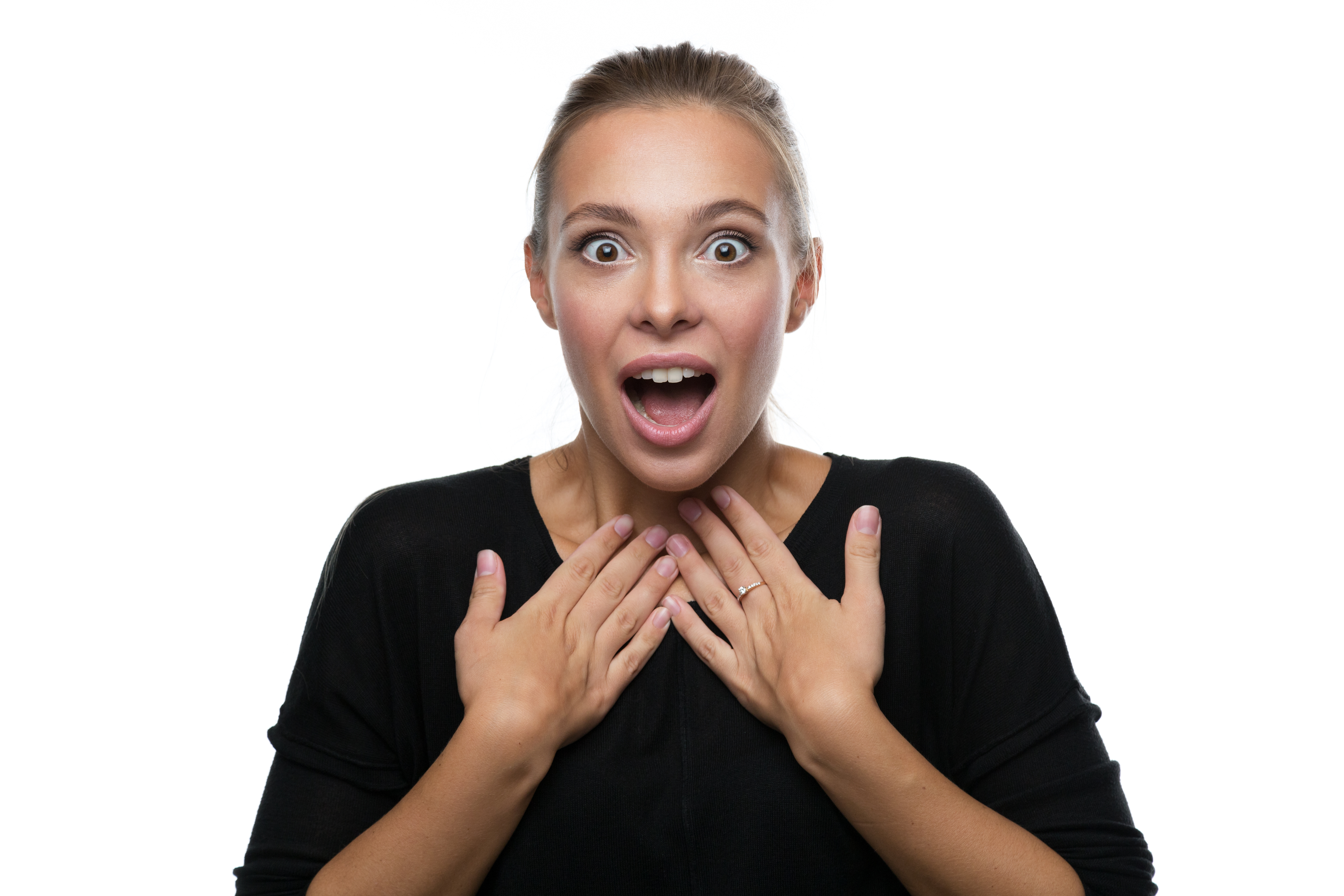 Portrait of surprised woman on white background