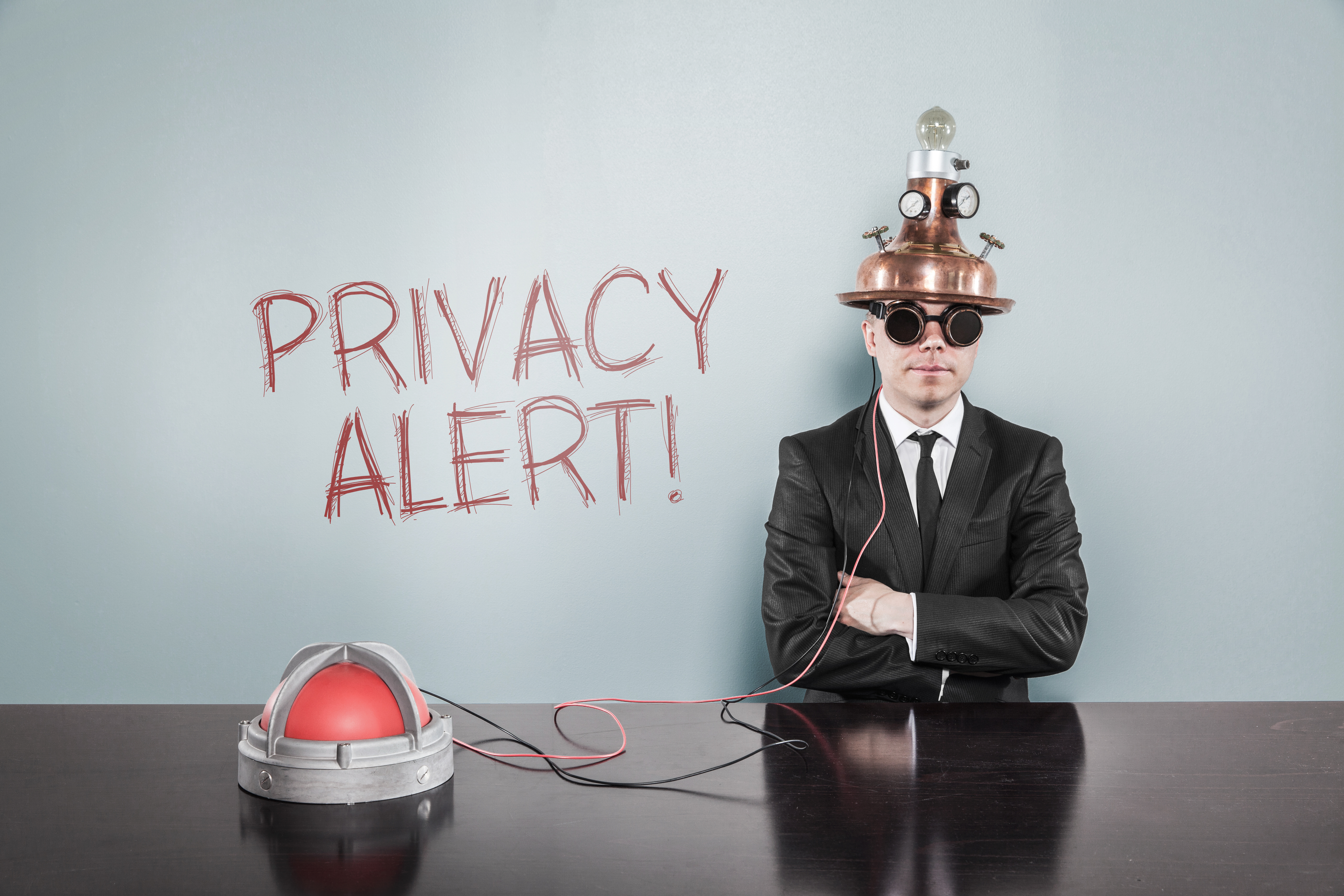 Privacy alert concept with vintage businessman and calculator